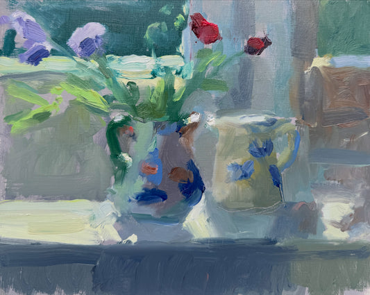 Two jugs, sweetpeas
