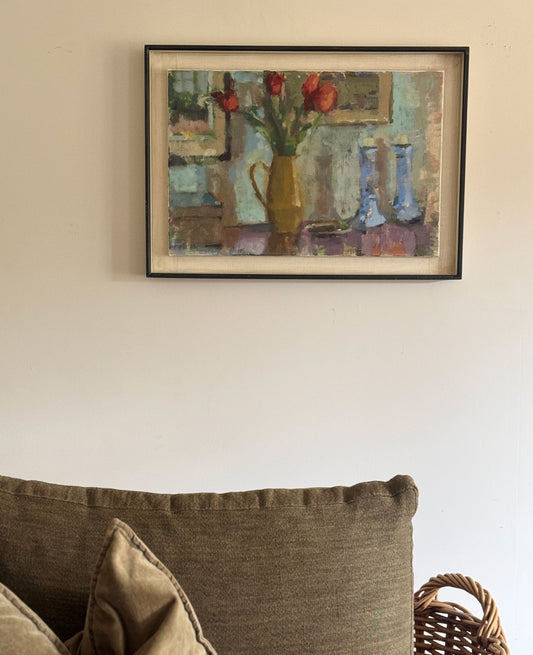 Red tulips in low light