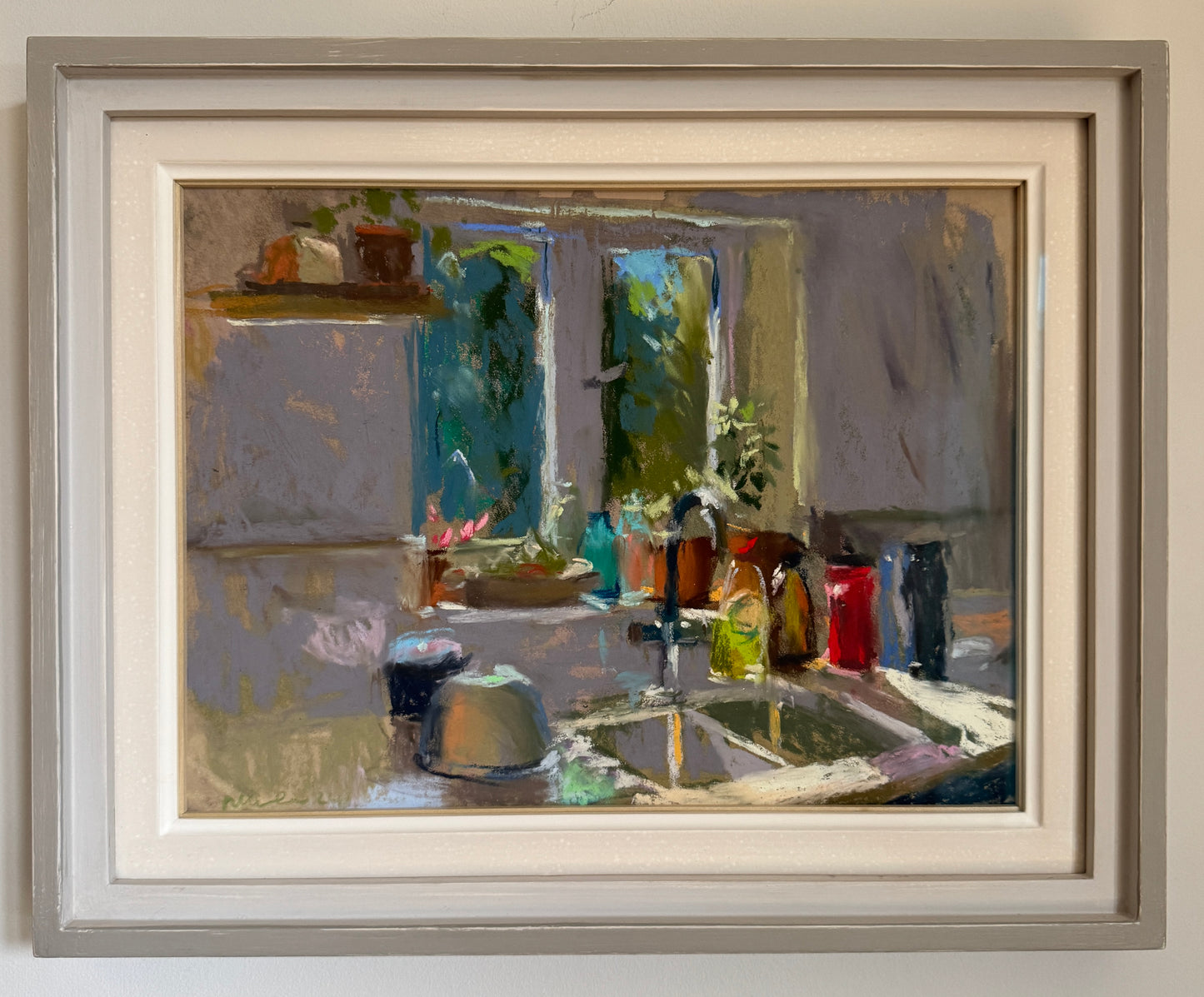 Cluttered kitchen sill